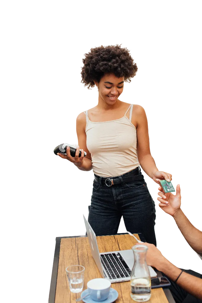 Man paying waitress by card